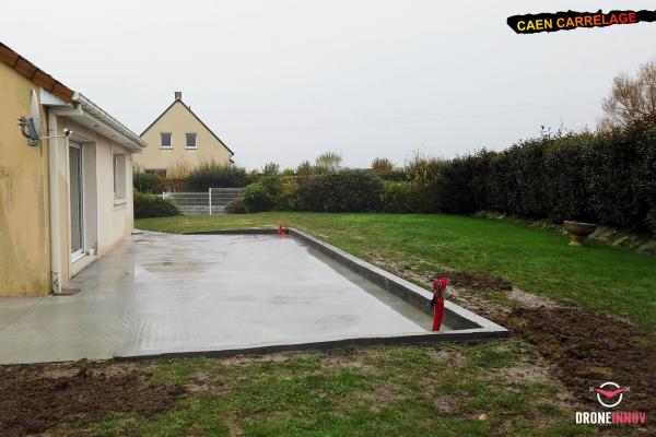 Terrasse et murs de soutènement réalisés par Caen Carrelage